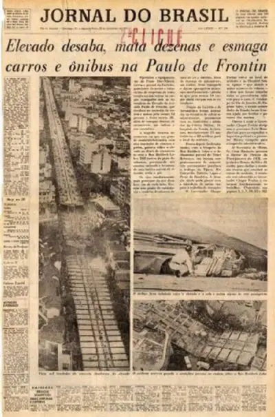 Página de jornal em preto e branco sobre desastre em área urbana.