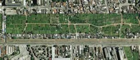 Parque em Madureira, Rio de Janeiro, com áreas verdes e edifícios ao redor.