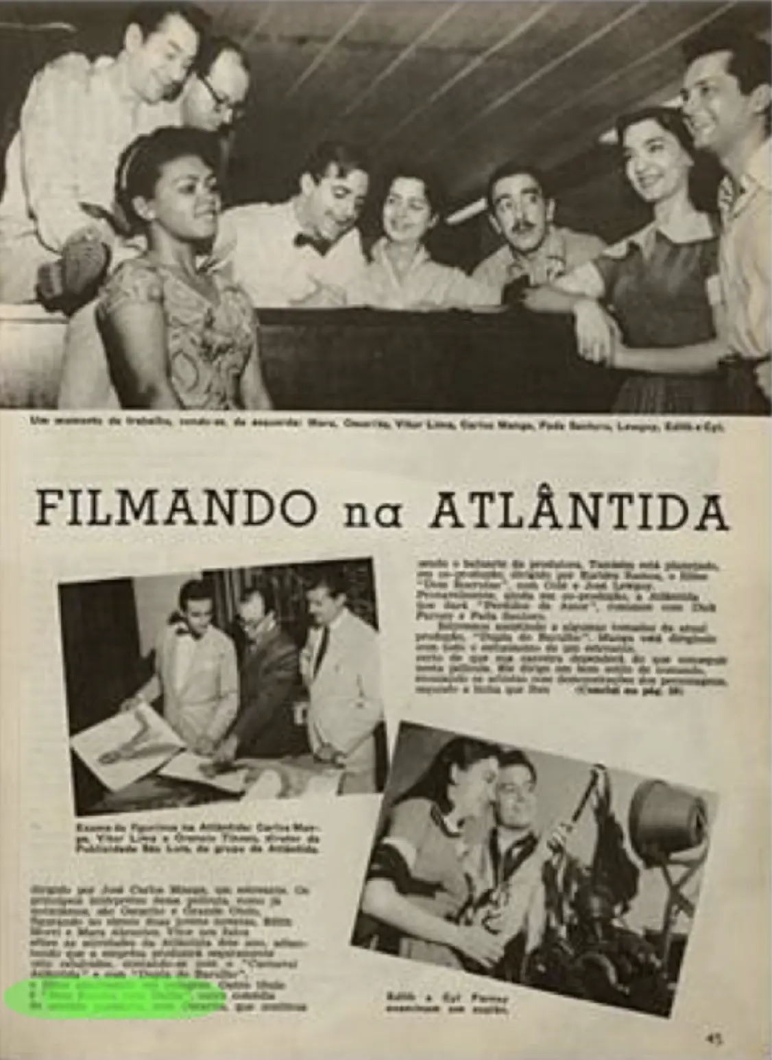 Grupo de pessoas sorrindo em estúdio de cinema, filmando na Atlântida.