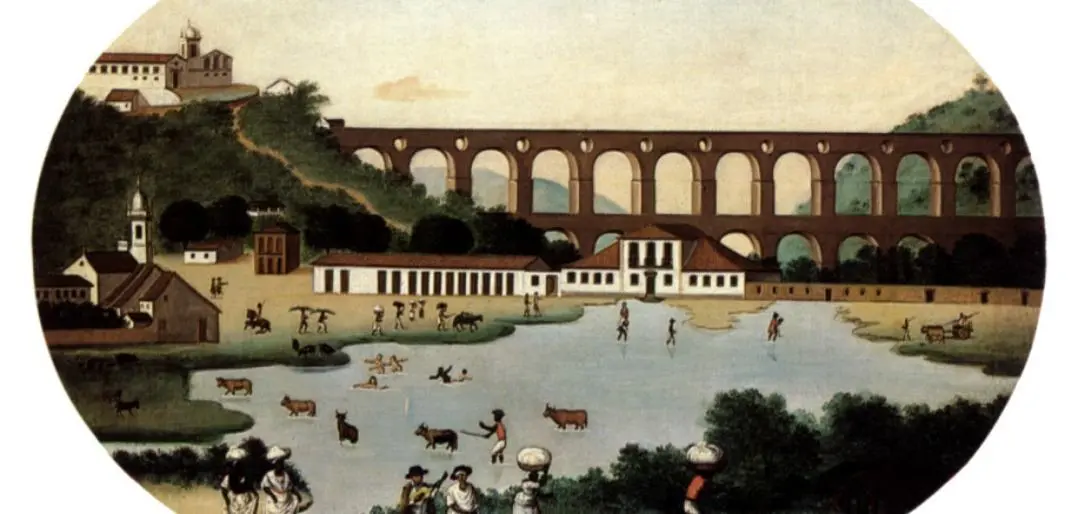 Ponte de arcos com rio e animais em São Paulo.