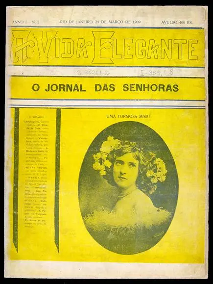 Capa de revista antiga de 1909, "A Vida Elegante", com mulher e flores.