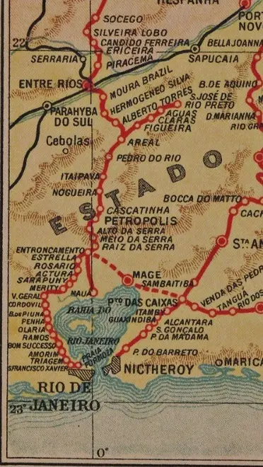 Mapa em preto e branco do Rio de Janeiro, Brasil, mostrando rotas de trens e estradas.