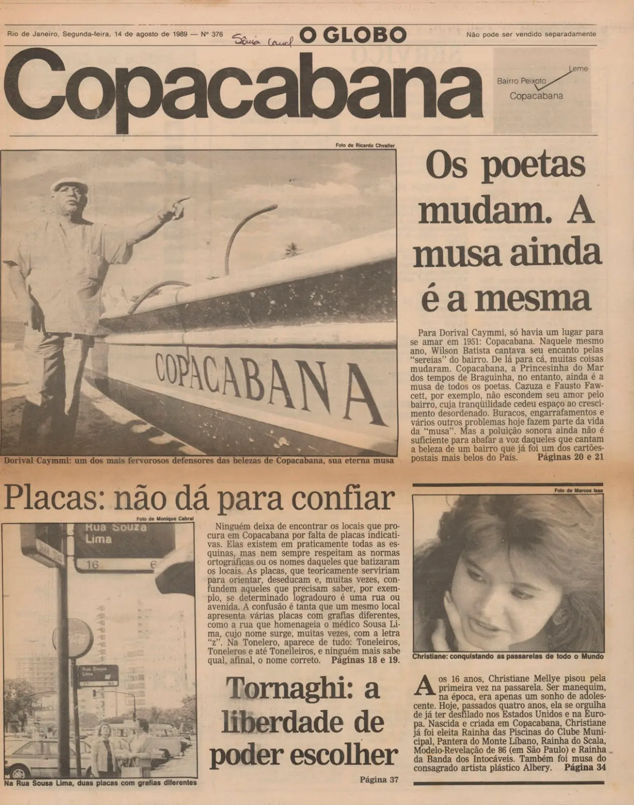 Página de jornal em preto e branco sobre Copacabana, com fotos e textos sobre Dorival Caymmi e Tornaghi.